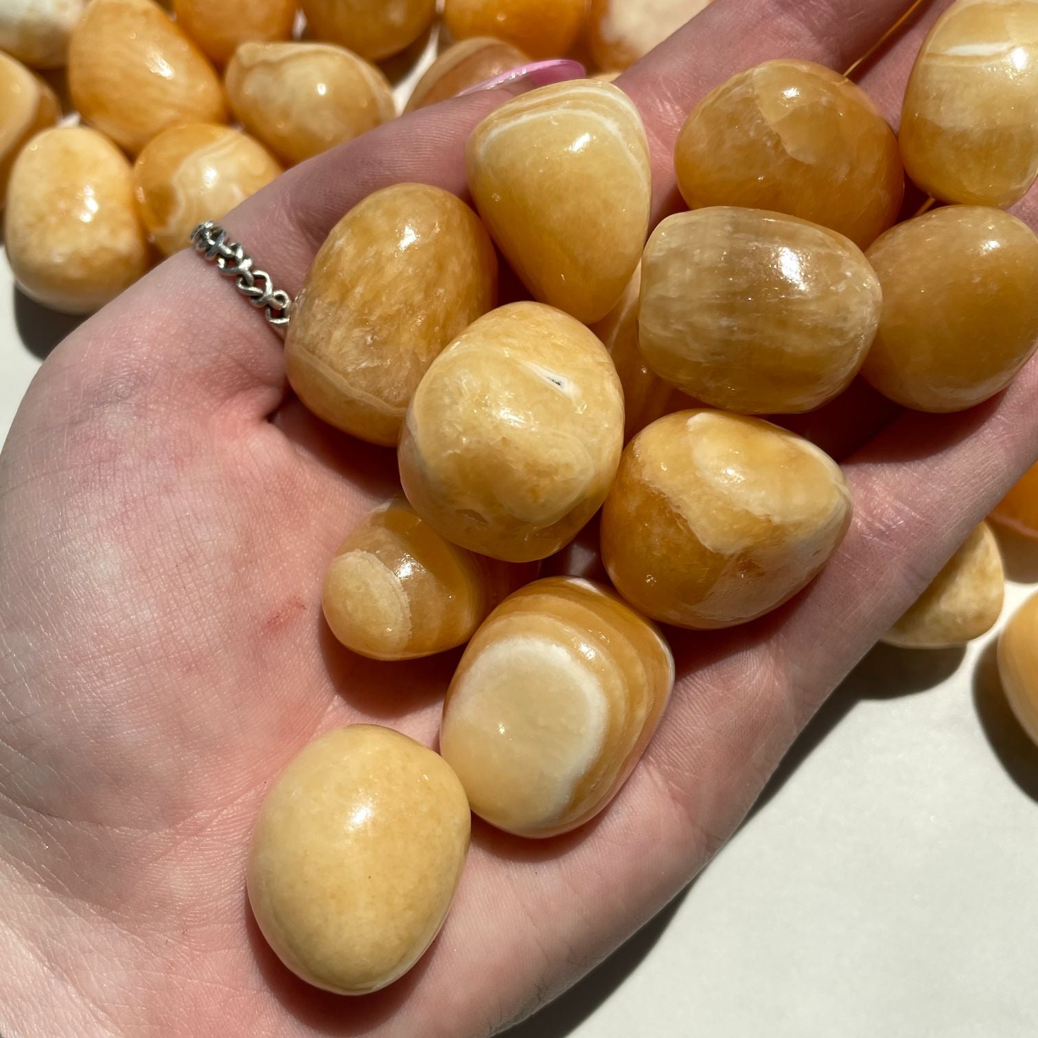 Orange Calcite Tumbled 1KG - Q1/A (50-70pcs) Orange Calcite Tumbled 1KG - Q1/A (50-70pcs)
